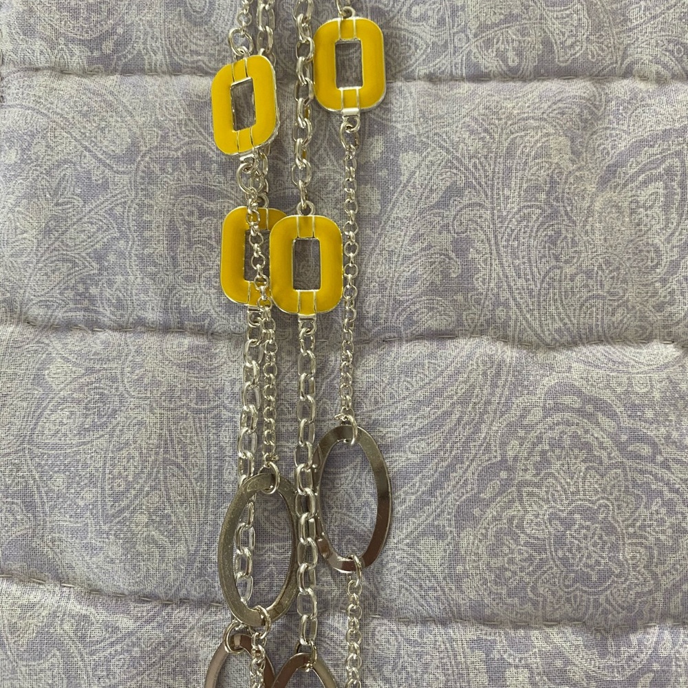 32” yellow and silver double strand necklace.